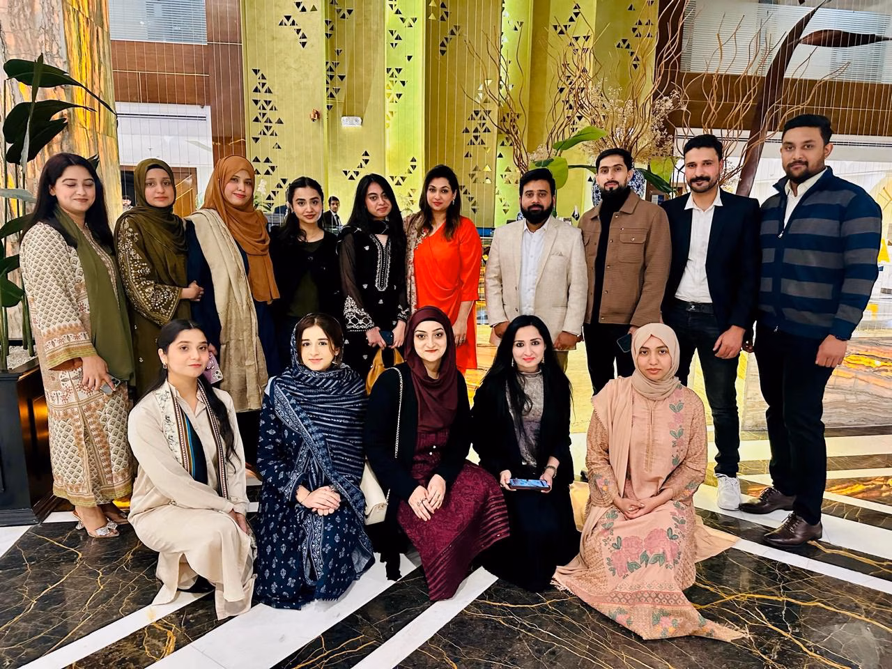 group photo of employees at cordatus resource group islamabad team